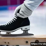 Home 22 스케이트 텐션 조절 - A detailed close-up of a professional ice skater’s hands adjusting the tension screws on the blade o...